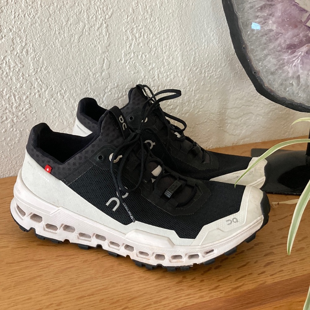 On Cloud shoes size 7 but seem to run a touch small.